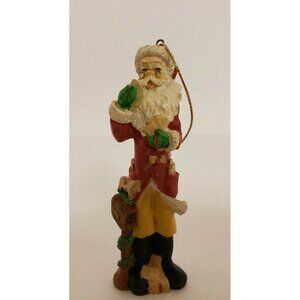 Christmas Ornament "Santa Checking his list" Plastic 1990s (OR133)